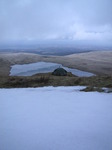 SX12933 Camping next to snow above Llyn y Fan Fawr lake.jpg